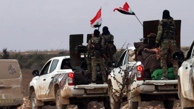 Syrian army soldiers are pictured in western Aleppo province, Syria, in this handout released by SANA on February 16, 2020. SANA/Handout via REUTERS ATTENTION EDITORS - THIS IMAGE WAS PROVIDED BY A THIRD PARTY. REUTERS IS UNABLE TO INDEPENDENTLY VERIFY THIS IMAGE.
